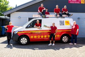 Team mit Auto